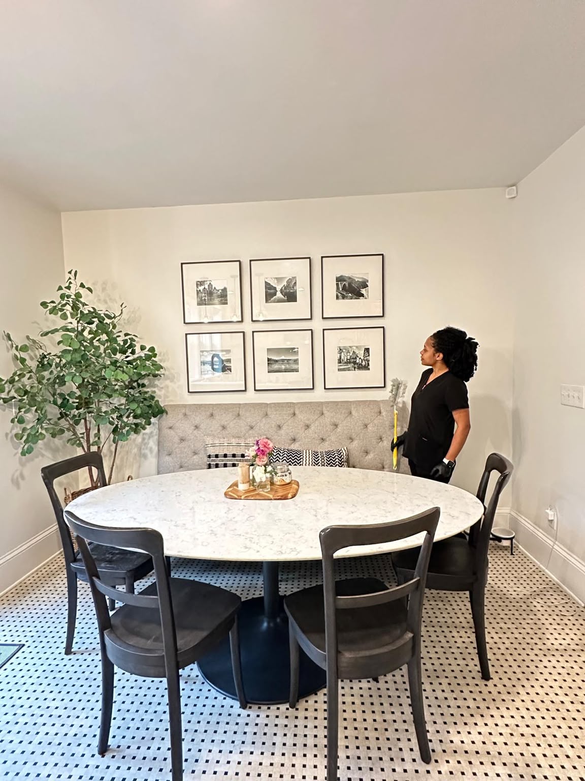 Keep Clean Solutions team member detailing a dining room in a Portland home